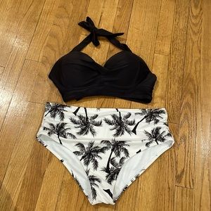 New swim suit black top and white floral bottom